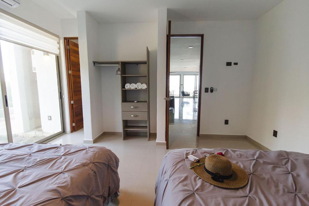 Angelina 28 Beachfront And Family Apartments - Modern And Relaxing Long Stays - 20 Min From Cancun Airport Puerto Morelos Exterior foto